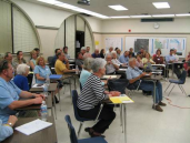 Picture of attendees at a special study area workshop at a school.